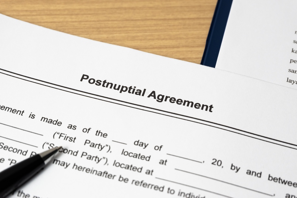 Legal document Postnuptial Agreement on paper